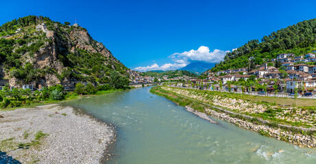 A panorama view along the River Osum towards the castle and Old Quarter in Berat, Albania in...