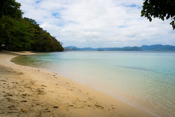 Untamed Tropical Beach with Intense Blue Crystal Clear Water