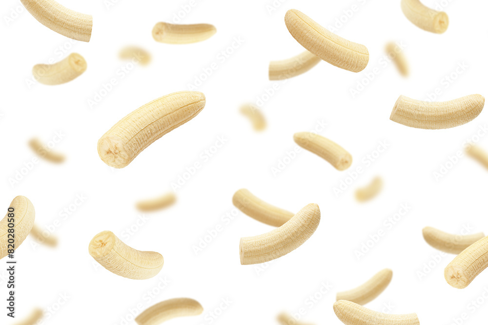 Wall mural falling banana, half peeled fruit, isolated on white background, selective focus - Wall murals