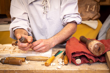 Wood craftsman working with his hands