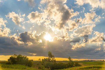 Rain clouds over crop fields in southern Brazil