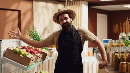 Zero waste supermarket storekeeper participates in TV show segment promoting organic food and vegan...