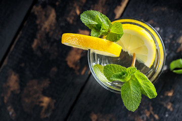 Lemonade with Fresh Mint and Lemon on Old Boards, Healthy Summertime Drink