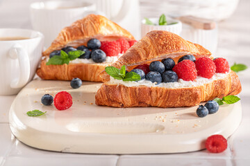 Sweet and hot french croissant made of puff pastry.