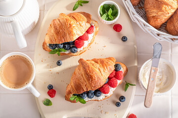 Sweet and hot french croissant for healthy breakfast.