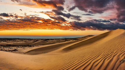 Sunset view of sand dunes 16:9 with copyspace