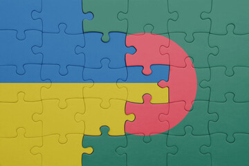 puzzle with the colourful national flag of bangladesh and flag of ukraine.