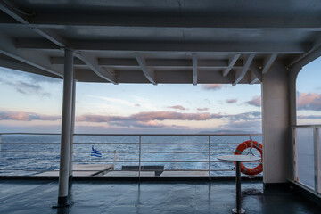 View of the Aegean Sea from a ferry boat at sunrise in Greece 