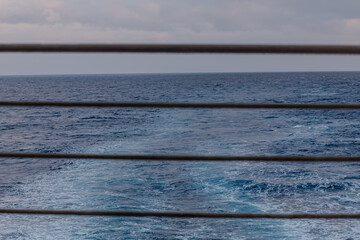 View of the Aegean Sea from the metallic barriers of a ferry boat