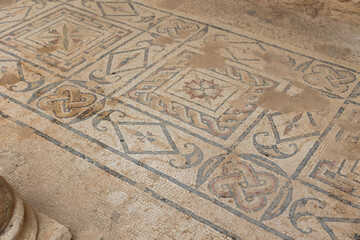 Preserved mosaics of Grand Nymphaeum in Roman settlement of Dougga with traditional geometric...