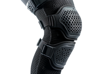 Black knee pad with mesh fabric for breathability and protection during sports