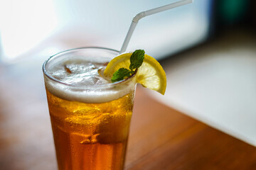 Lychee Iced Tea or Es Leci tea with Mint Leaves in a Glass
