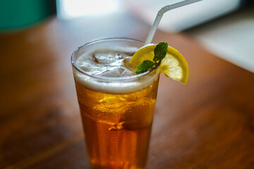 Lychee Iced Tea or Es Leci tea with Mint Leaves in a Glass