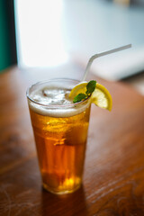 Lychee Iced Tea or Es Leci tea with Mint Leaves in a Glass