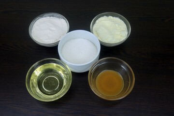 Soybean Oil, Masala, Chilli, Cherries, Flour, Flour, Butter, Cloves, Milk, Salt, Ghee, Yoghurt, Sugar, Lemon, Mustard Oil, Green Chillies, Onion Ingredients are kept in glass container