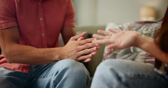 Couple, hands and conflict with argument in home for divorce, fight and mistake in marriage. People, closeup and frustrated for cheating, betrayal and jealousy in living room with toxic relationship
