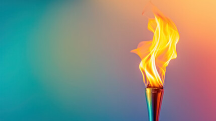 vibrant olympic flame on metal torch against colorful gradient background