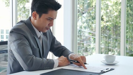 Failure businessman stress bankruptcy man sitting wood desk feeling nagative depression have...