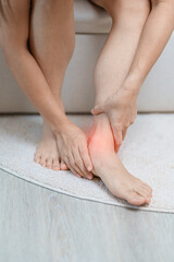 woman having leg pain due to Ankle Sprains or Achilles Tendonitis and Shin Splints ache. injuries,...