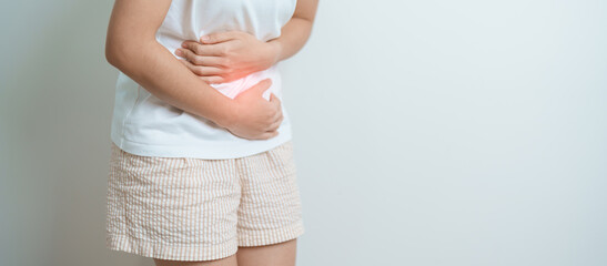 woman having abdomen ache due to Stomach pain, digestion with constipation or Diarrhea from food poisoning, female problem and Endometriosis, Hysterectomy and Menstrual