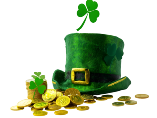 A leprechaun hat, gold coins and clover leaves isolated on a transparent background cut out. 