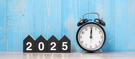 2025 Happy New Year with retro alarm clock and wooden number. New Start, Resolution, Goals, Plan,...