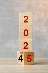 block flipping 2024  to 2025 text on table. Resolution, strategy, plan, goal, motivation, reboot, business and New Year holiday concepts