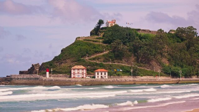 House on hill by ocean