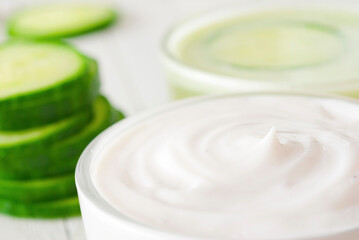 Facial mask with slices of cucumber