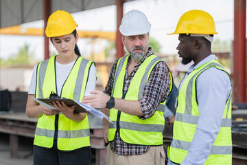 Senior engineer and foreman worker team inspect the construction site, Site manager and builder...