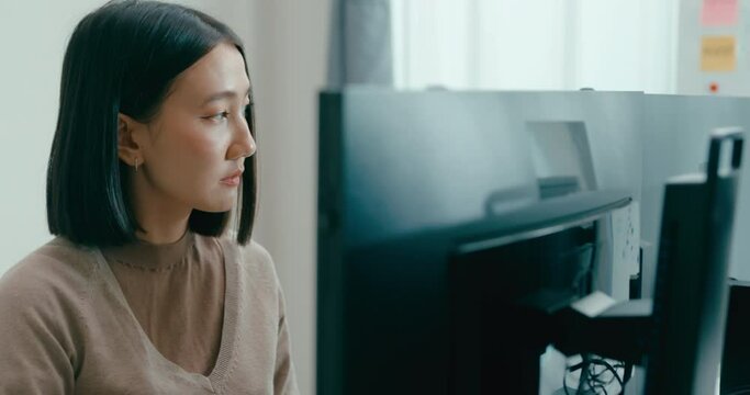 Young adult Asia female freelance typing write prompt AI bot IT app smart program nomad, video game, terminal with coding language, user interface, designer, big data center on desktop computer.