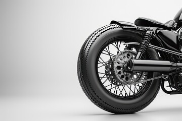 Fototapeta premium Motorcycle wheels showcased against a neutral white surface.