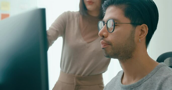 Closeup group Adult Asia male, female freelance meeting write prompt AI bot IT app smart program nomad, video game, talk strategy, discuss plan, user interface, designer, data center desktop computer.