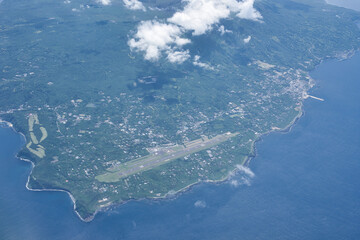 Tokyo,Japan - May 15, 2024:  Aerial view of Oshima airport or Tokyo Oshima Camellia Airport in Izu Oshima island, Tokyo