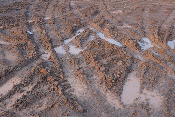 tracks in sand at construction site