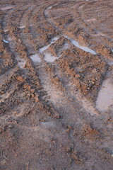 tracks in sand at construction site