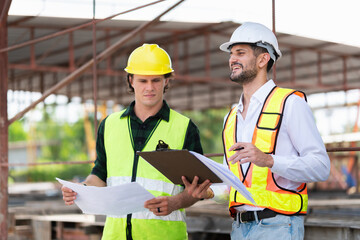 Engineer and foreman worker team inspect the construction site, Site manager and builder on construction site.