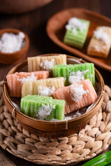 Getuk Lindri is a traditional Indonesian dessert made from mashed cassava, and topped with grated coconut. Selective focus. Perfect for recipes, articles, catalogs or any commercial purpose