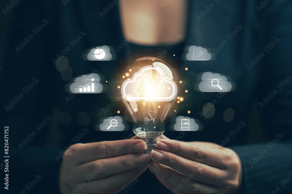 Poster light bulb in hand. big data analysis and business concept with charts and graph icons on digital sc