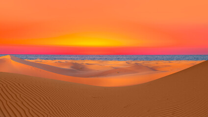 Sahara desert with Atlantic ocean meets near coast - Morocco, North Africa