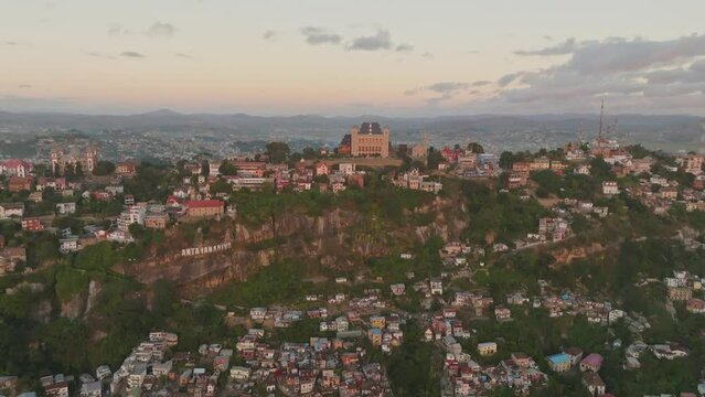 Rova - Queen's Palace on the hill in Antananarivo in Madagascar st sunset. Aerial drone 4K clip.