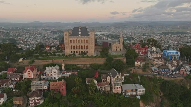 Rova - Queen's Palace on the hill in Antananarivo in Madagascar in evening. Aerial drone 4K clip.