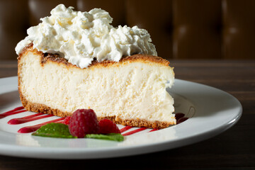 A closeup view of a cheesecake slice.