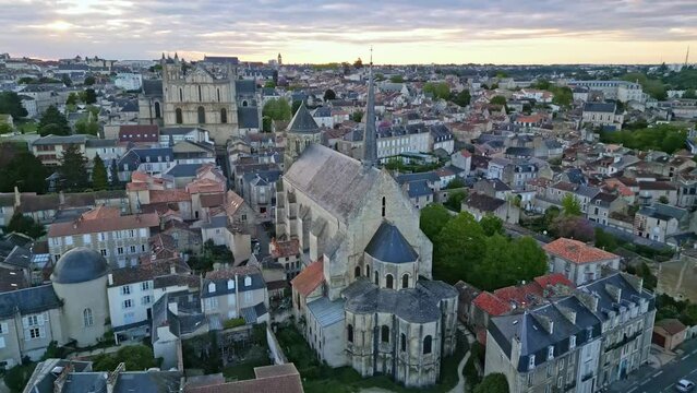 Sainte-Radegonde church and Saint Pierre cathedral, Poitiers in France. Aerial orbiting and cityscape