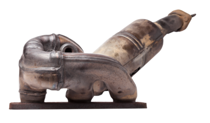 Automotive catalyst removed from a vehicle for repair with a ceramic coating inside as part of an exhaust system to remove harmful emissions in a car repair shop