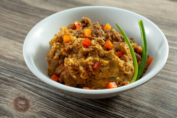 A view of a bowl of corn bread dressing.