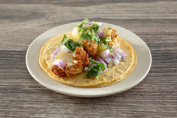 A closeup view of a cauliflower taco.