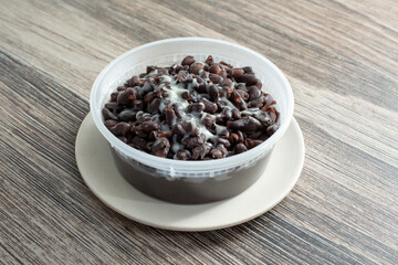 A view of a container black beans.