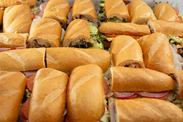 A view of several half sandwiches.