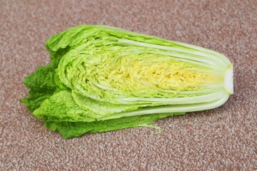 Fresh white cabbage or (Brassica pekinensis L) This vegetable is also known as Chinese cabbage and Napa cabbage.
With a close look.